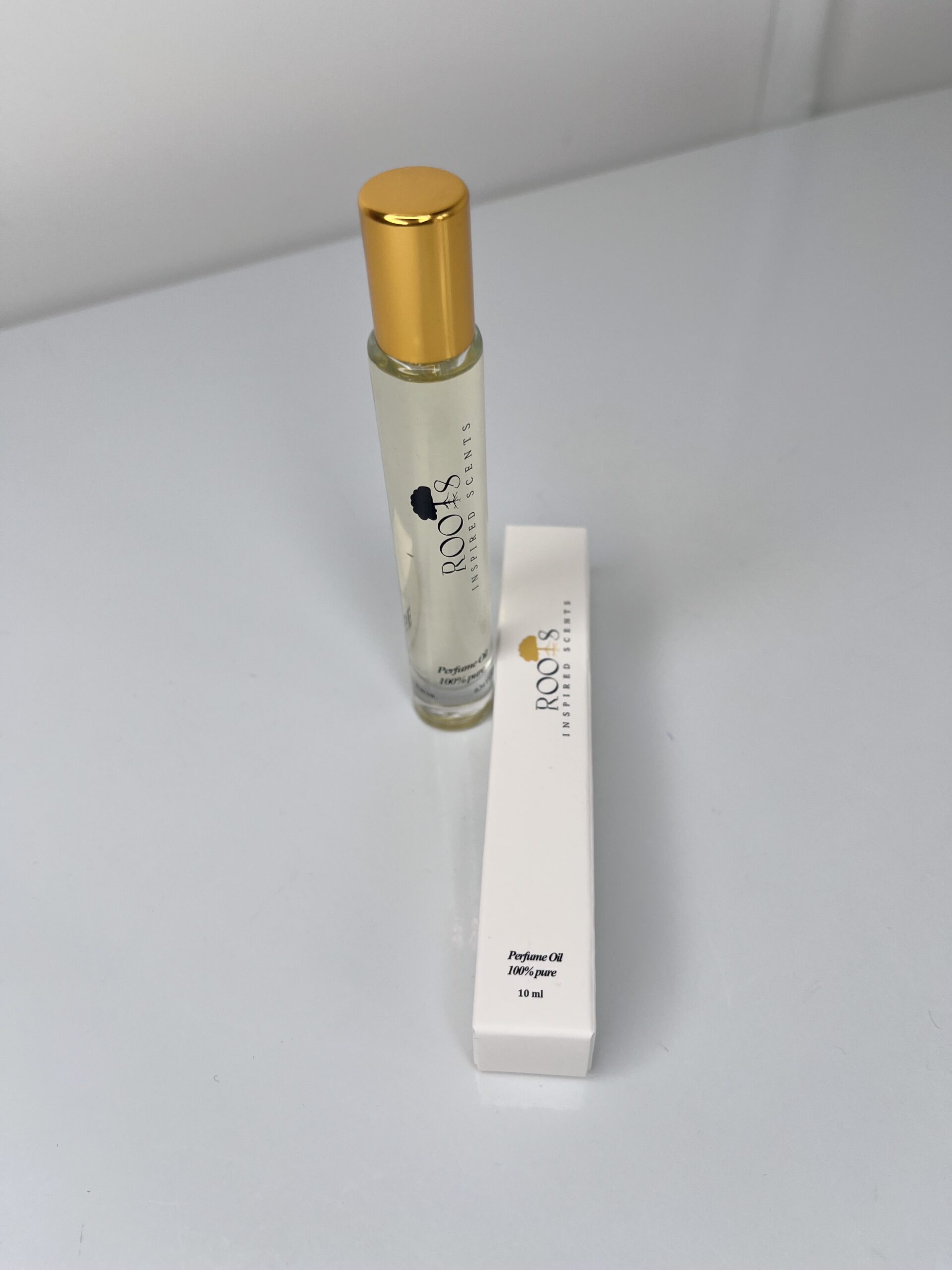 Roots perfume bottle and it box